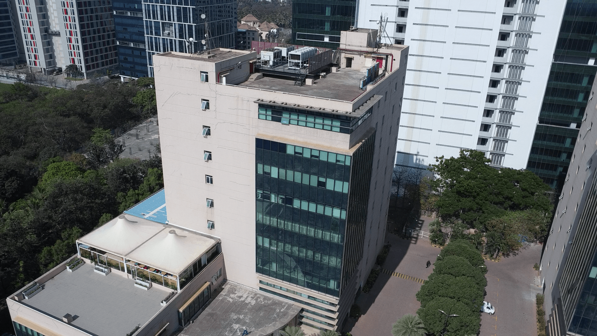 Drone inspecting a building facade
